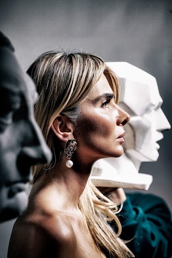 Closeup Photo of Woman Between Headbusts