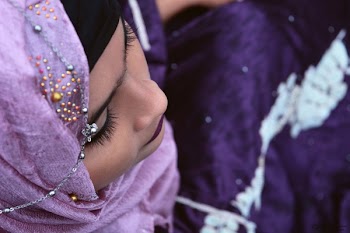 Closeup Photo of Woman in Purple Hijab Headscarf