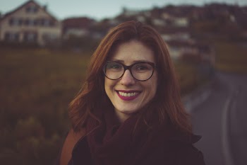 Closeup Photo of Woman Wearing Eyeglasses