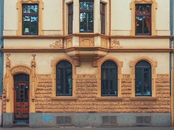 closeup photo of yellow concrete house