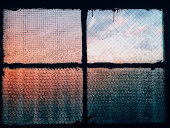 closeup photography of clear glass window closed