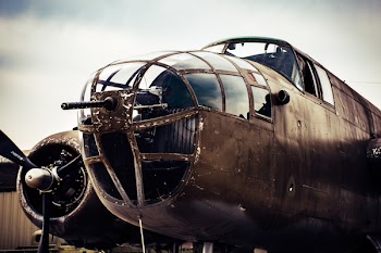 Closeup Photography of Grey Biplane