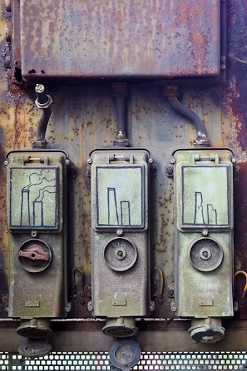 Closeup Photography Three Gray Circuit Breakers