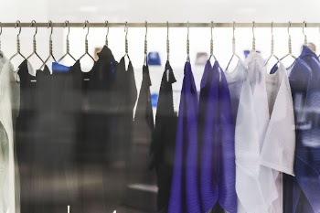 Clothes hanging on rack, looking | Free Photo - rawpixel