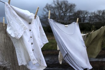 Clothing on clothesline in garden. | Free Photo - rawpixel