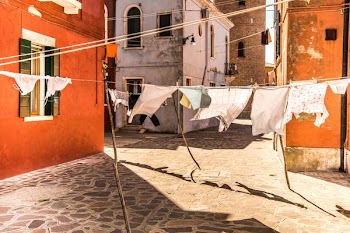 cloths hanging on rod