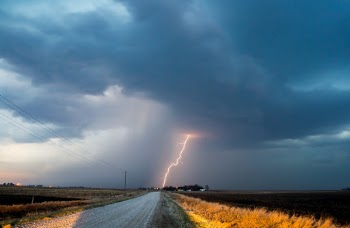 Cloud-to-ground lightning 1. 5 miles west-northwest of Gilbert, IA.