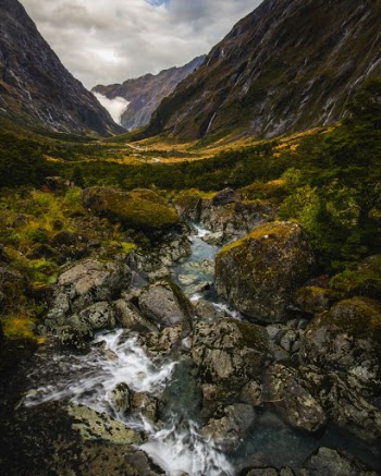 Clouds begin to part over the the road to Milford Sound, New Zealand. 
