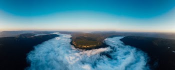 Clouds Covering The River In A Mountain