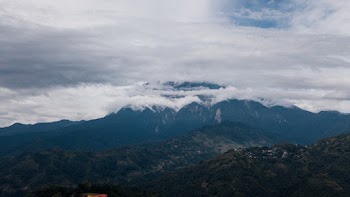 Clouds On The Mountain Summit