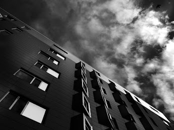 Clouds over Building in Silhouette