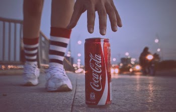 Coca Cola can on a street | Free Photo - rawpixel