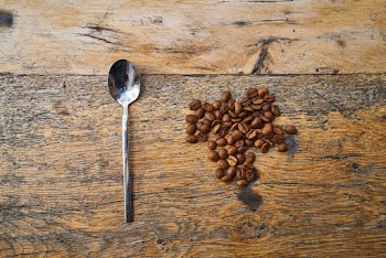 Coffee Beans Beside Tea Spoon