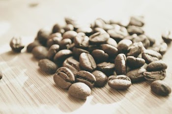 coffee beans on brown surface