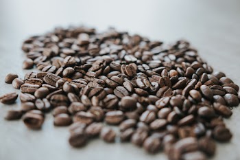Coffee Beans on Brown Surface