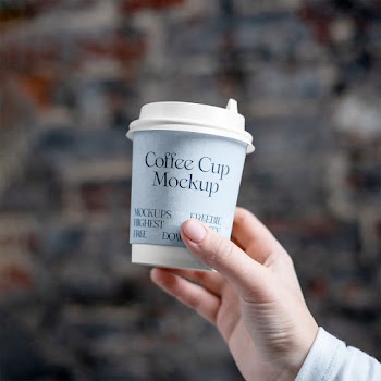 Coffee Cup in Hand Mockup