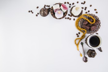 Coffee cup with dates fruit and beads