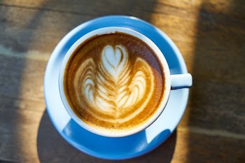 Coffee-filled Ceramic Mug on Saucer
