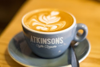 Coffee Latte Filled Cup on Saucer