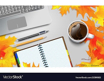 coffee mug on the table with autumn leaves