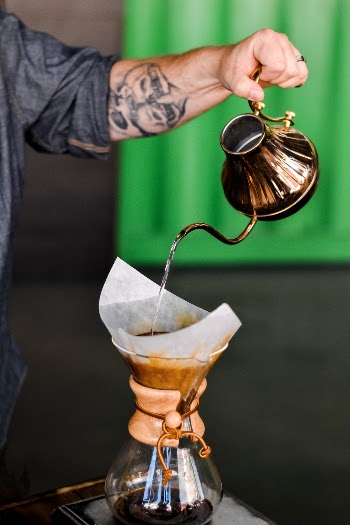 Coffee Roaster Rickard from Sweden demonstrates the art of both Fika (the Swedish coffee break) and a Chemex pour over.