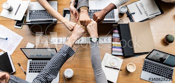 Colleagues giving a fist bump
