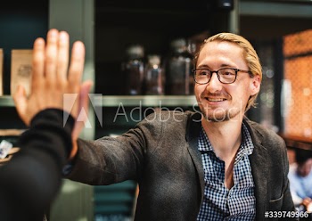 Colleagues giving a high five