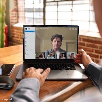 Colleagues having a video conference on a laptop mockup during the cor.. | Free  psd mockup - 2312915