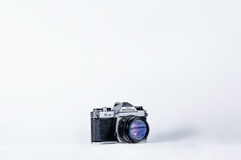 Collecting cameras is my hobby. When I got this particular camera, I knew I had to do a photoshoot for it. This photo makes me want to take more photos. Seeing a film camera is like observing a piece of history that captured history and knowing I can do the same, inspires me.