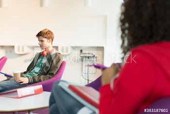 College student studying in student lounge