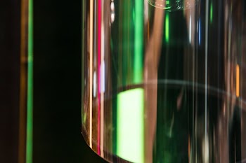Colored Light Reflects In Glass