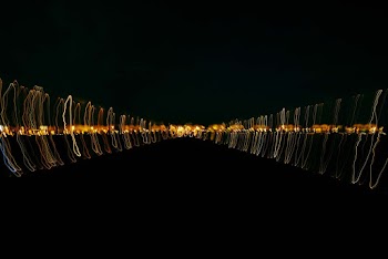 Colored Light Waves Forming A Pattern