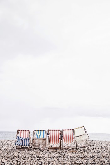 Colored striped beach chairs on the beach | Free Photo - rawpixel