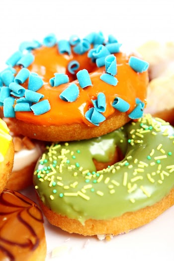 Colorful and tasty donuts Free Photo