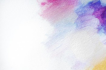 Colorful brush stroke on a canvas background