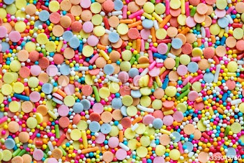 Colorful confetti sprinkles textured background