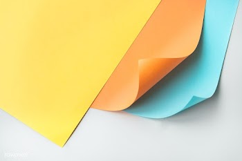Colorful curled paper on a gray background | Free  photo - 2353888