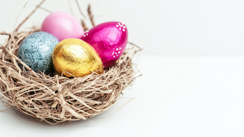 Colorful Easter Eggs in Rustic Nest