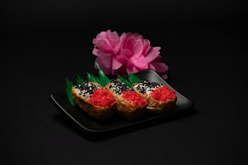 Colorful Japanese Sushi Rolls with Edible Flowers