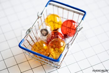 Colorful light bulbs in a basket