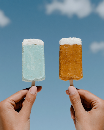 Colorful Protein Bars Against a Bright Sky