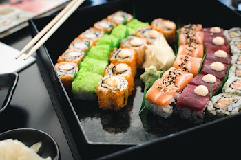 Colorful sushi in a black box 