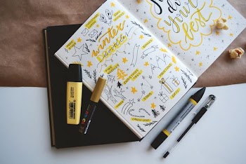 coloring book and four markers