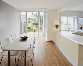 colour image kitchen in newly restored rebuilt house work surfaces