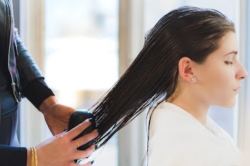 Combing Hair At Salon