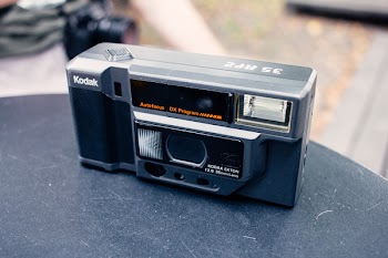 Compact automatic film camera