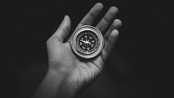 Compass On Hand