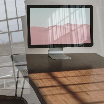Computer screen mockup, wooden table | Free PSD Mockup - rawpixel