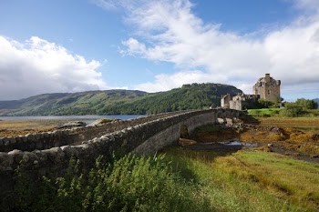 concrete bridge leading to castle