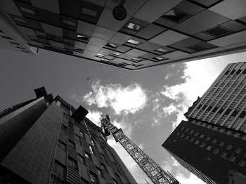 Concrete Buildings Under Cloudy Sky